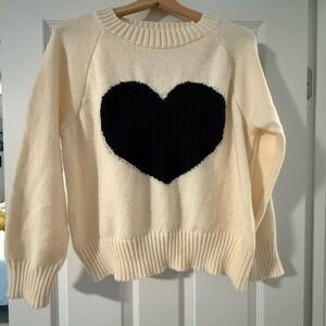 Creme colored sweater with black heart